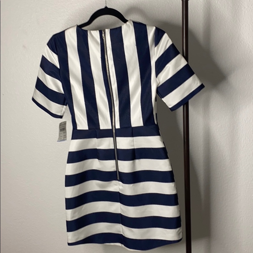 Cute brunch dress. Size 4. Never worn.